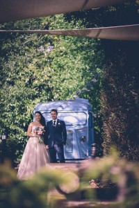 Couple portrait by vintage blue van
