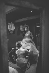 Bride putting shoes on