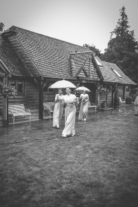 Bridesmaids with umbrellas