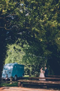 Couple by vintage blue van