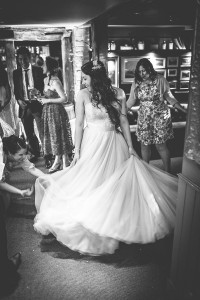 Bride swishing floor length dress