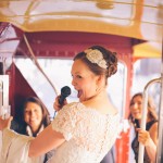 Bride on routemaster with microphone