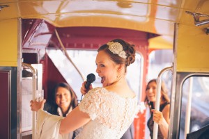 Bride on routemaster with microphone