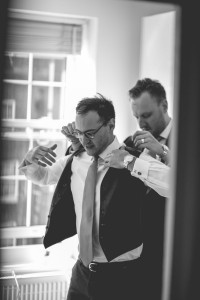 Groom getting dressed