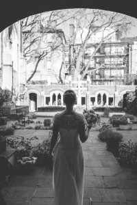 Bride looking out on garden