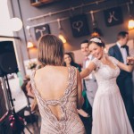 Bride dancing with friend