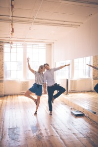 Couple dancing infront of mirrors