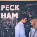 Couple by Peckham sign