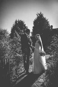 Bride and groom in garden
