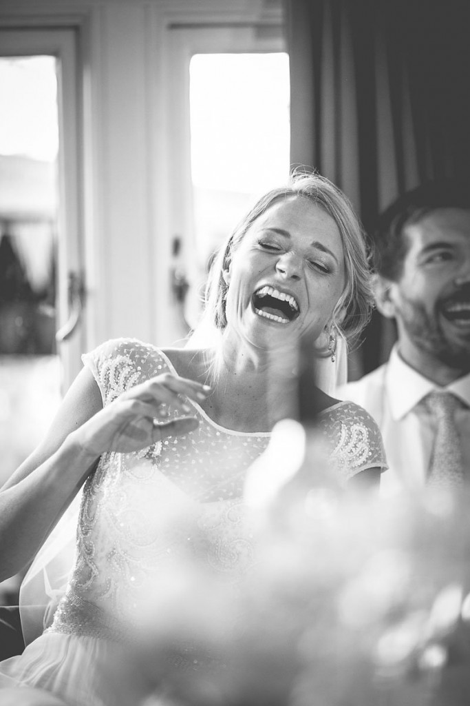Bride laughing at speech