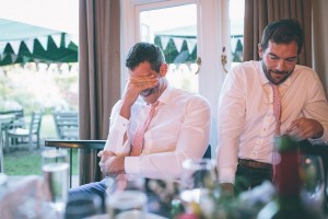 Groom laughing