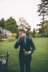 Guest in garden with polaroid camera