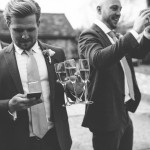 Groom with drinks in hand
