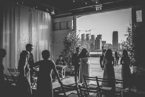 Guests waiting for bride with London backdrop