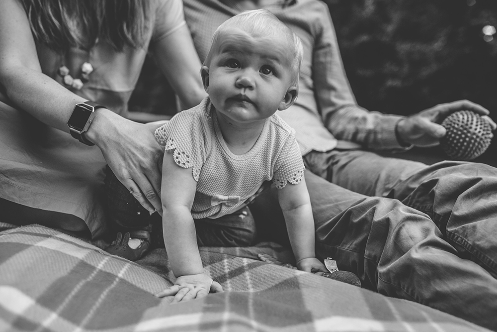 family photoshoot london baby on blanket