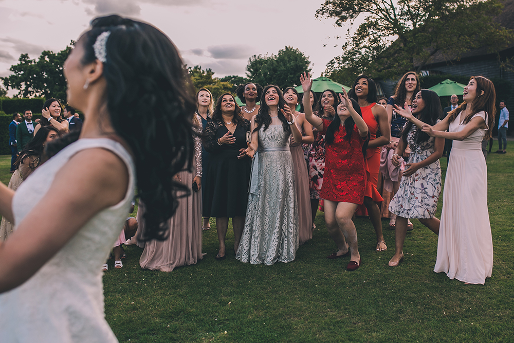 throwing bouquet micklefield hall multicultural wedding